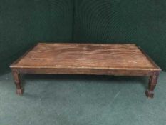 A large Japanese style cane top coffee table