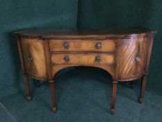 An inlaid mahogany Regency style sideboard