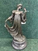 A bronze figure on marble base,