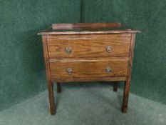 An oak two drawer chest