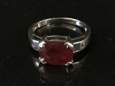 An 18ct white gold ring set with a large ruby