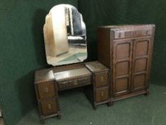 An oak linen chest and matching dressing chest