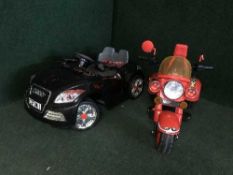 A child's ride on motorbike and car