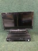 A Toshiba 26 inch LCD TV with remote and a Panasonic DVD/VCR recorder and remote