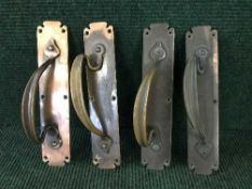 Four copper Art Nouveau door handles