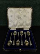 A set of six silver cased teaspoons
