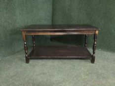 A stained oak coffee table
