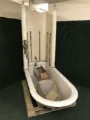 A Victorian cast iron canopy bath with fittings