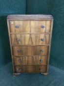 A walnut bachelors chest