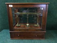 A mahogany cased set of scales stamped Knowles Patent Yarn Balance, Goodbrand & Co.
