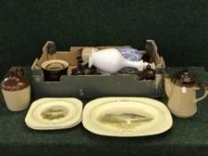 A box of pottery teapots, flaggons, storage jars, etc, mirror, etching,