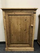 A reclaimed pine single door cupboard
