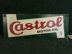 A cast metal Castrol motor oil wall plaque