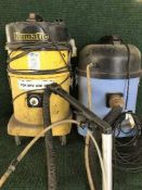 Two industrial vac cleaners