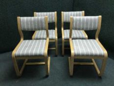 Eight beech framed upholstered dining chairs