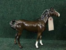 A Beswick brown gloss horse