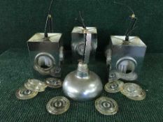 A box of vintage metal light fittings