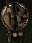 A tray of assorted watches, 1980's Bulova digital watch, gold plated Raymond Weil wrist watch,