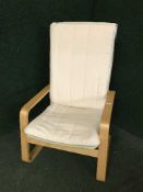An Ikea beech framed armchair