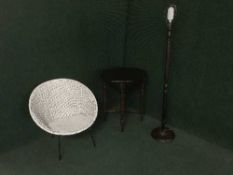 A mahogany standard lamp,