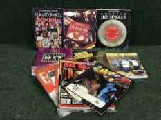 A box of assorted books - film & rock n roll and a collection of Elvis Presley calendars