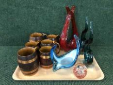 A tray of wooden tankards,