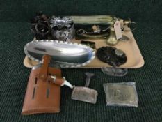 A tray of field glasses, hip flask, belt buckles, slide rules,