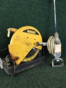 A Dewalt cement mixer and a Dewalt table saw