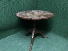 A late Victorian tilt top table on three way support