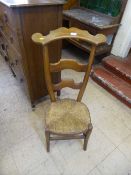 An oak rush seated country chair