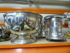 A large plated punch bowl together with two plated food warmers