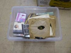 A box of assorted cds,