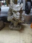 A garden figure of a gargoyle