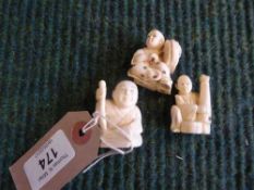 Three carved bone figural netsukes