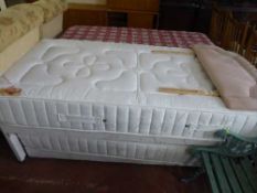 A 3' Beauty Sleep Topaz divan set fitted with truckle bed beneath