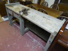 A workbench fitted with a vice