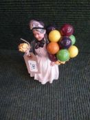 A Royal Doulton figure - Biddy Penny Farthing HN 1843