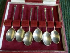 A set of six cased silver teaspoons
