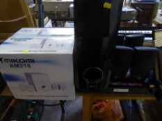 An LG Dvd surround sound system with leads and remote, together with a boxed Mikoni 5.