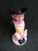 An early 20th century English pottery toby jug