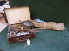 A Safari folding camp bed together with a small leather case containing brass lantern,