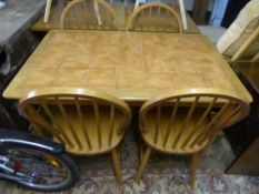 A beech tiled kitchen table and four chairs