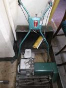 A Webb vintage petrol lawn mower with grass box