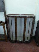 A walnut shaped display cabinet