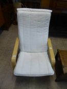 An Ikea beech framed armchair