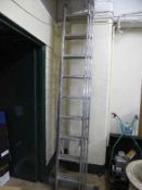 An aluminium triple section extension ladder