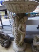 A garden three graces bird bath