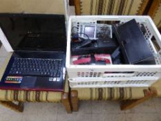 A Samsung Laptop together with a boxed Satnav, car cd changer, Logitech media box,