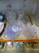 A tray of four lead crystal decanters together with two studio glass leaf bowls