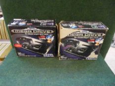 Two boxed Sega mega drives